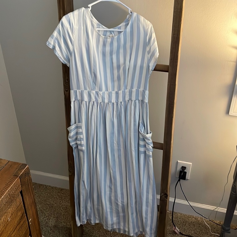 Blue and white striped dress with open back